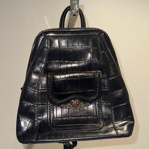 Black leather backpack with cute silver detailing